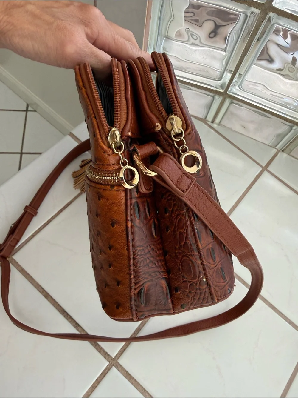 Women's Brown Crossbody Bag with Crock Print & Tassel Zip Pocket